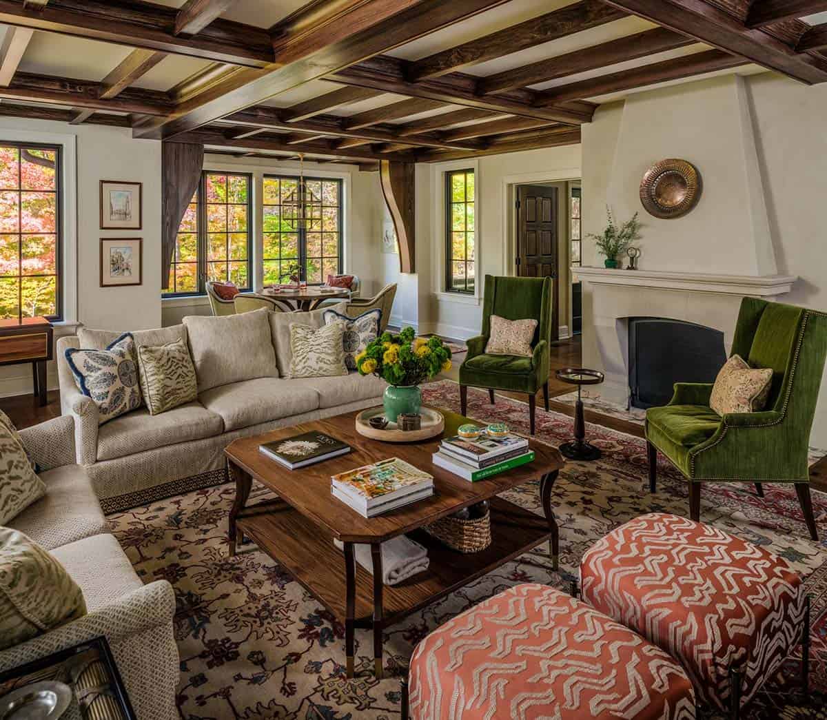 Living room with coffered wood ceiling and green wingback chairs