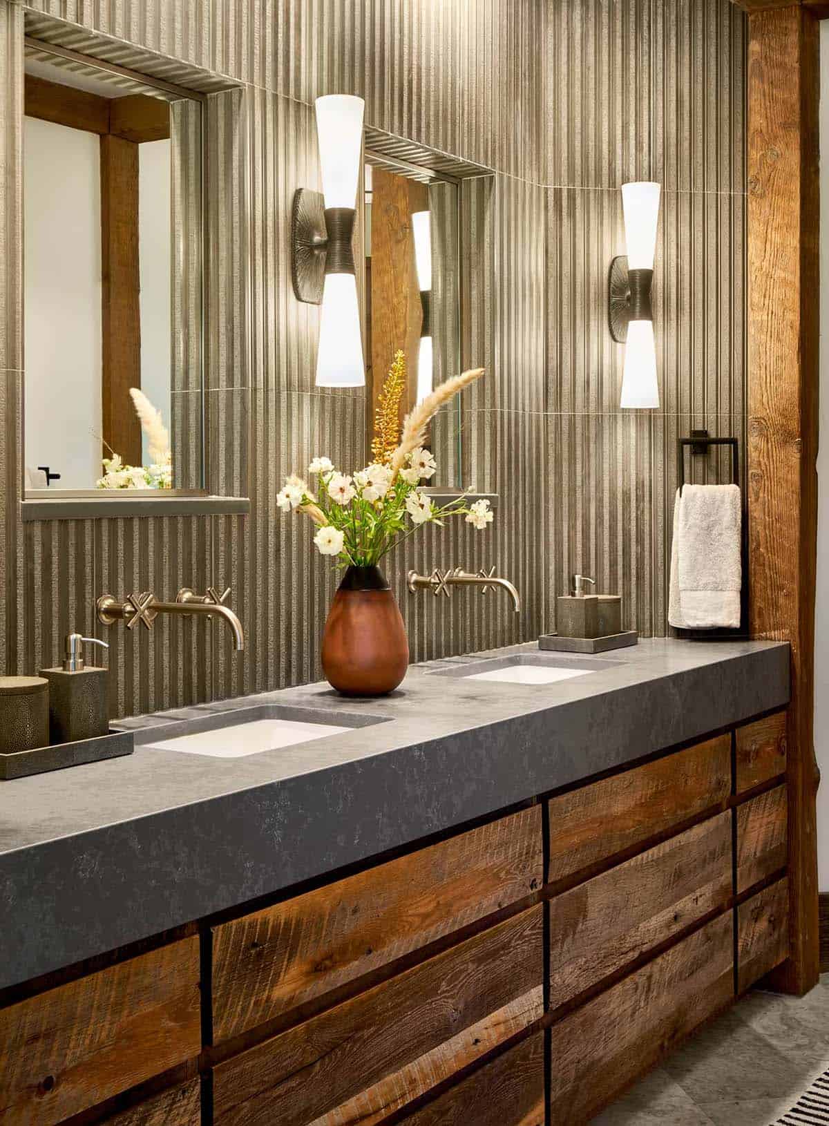 Double vanity with corrugated metal backsplash and wood cabinetry