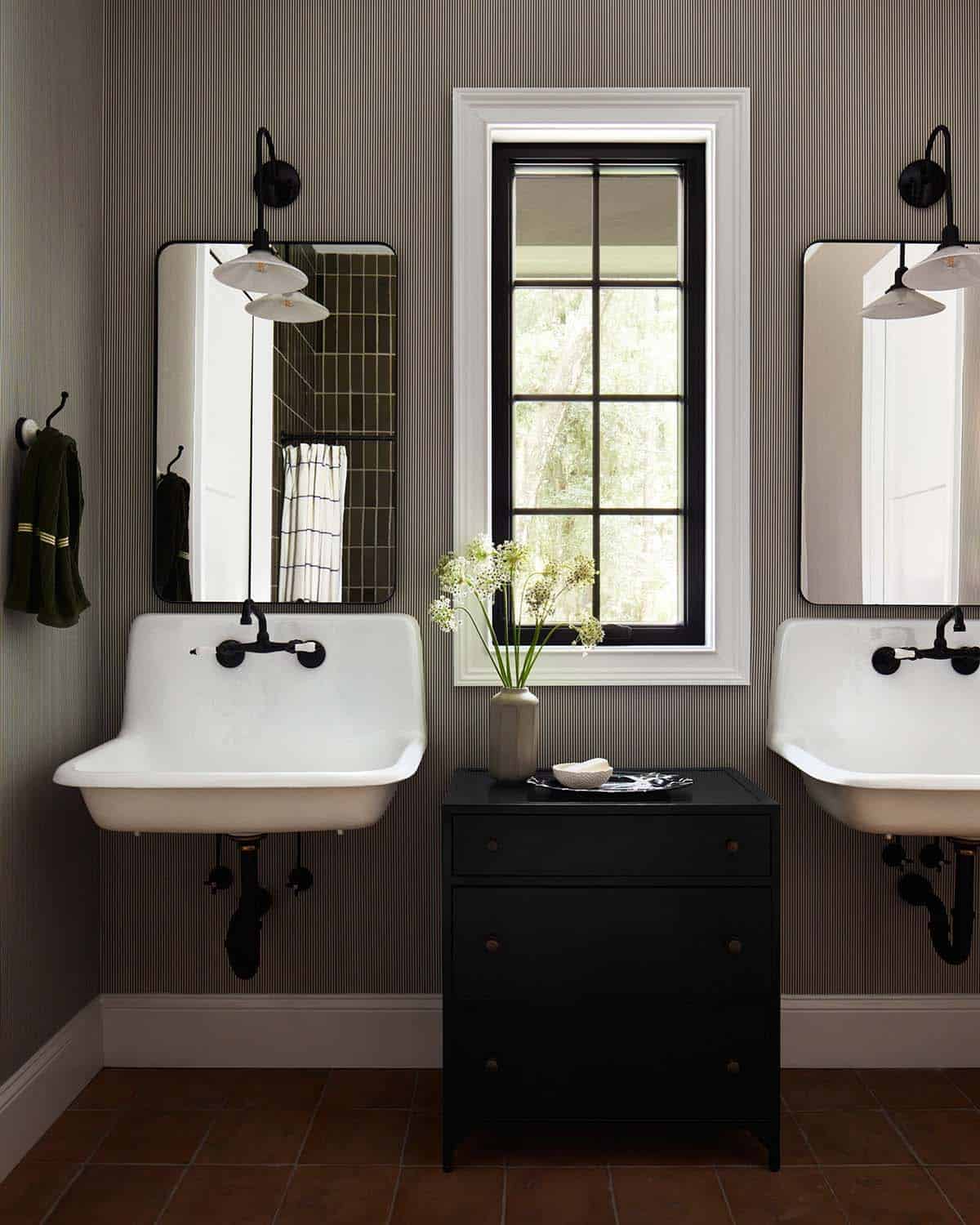 Trough sinks flanking black chest 