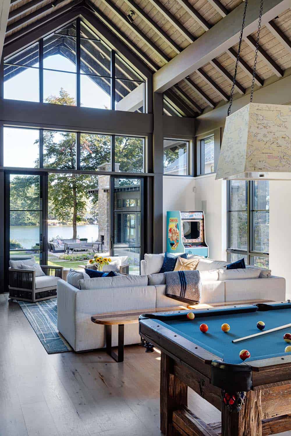 Recreation barn interior with pool table and arcade game