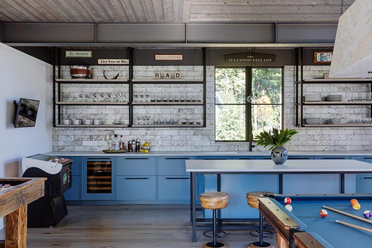 Game room with blue cabinetry, arcade machine, and pool table