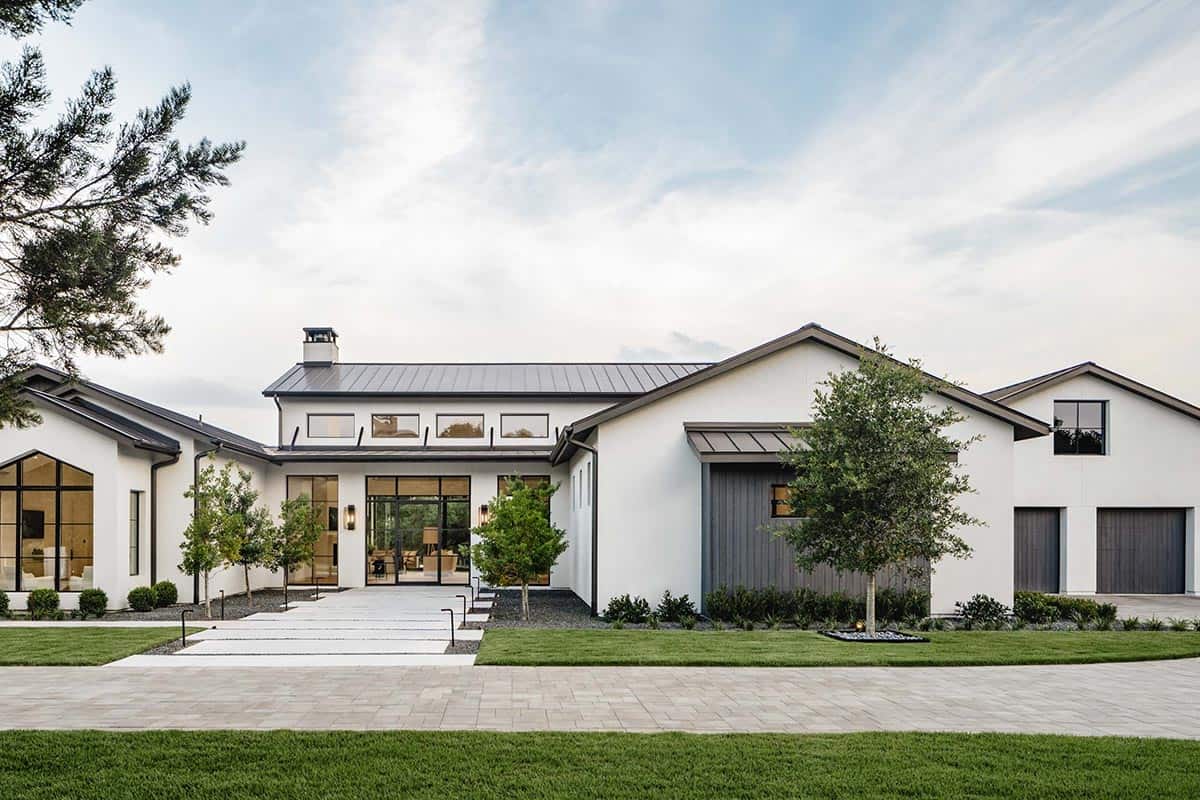 Front facade showing standing seam roof and vertical wood siding accents
