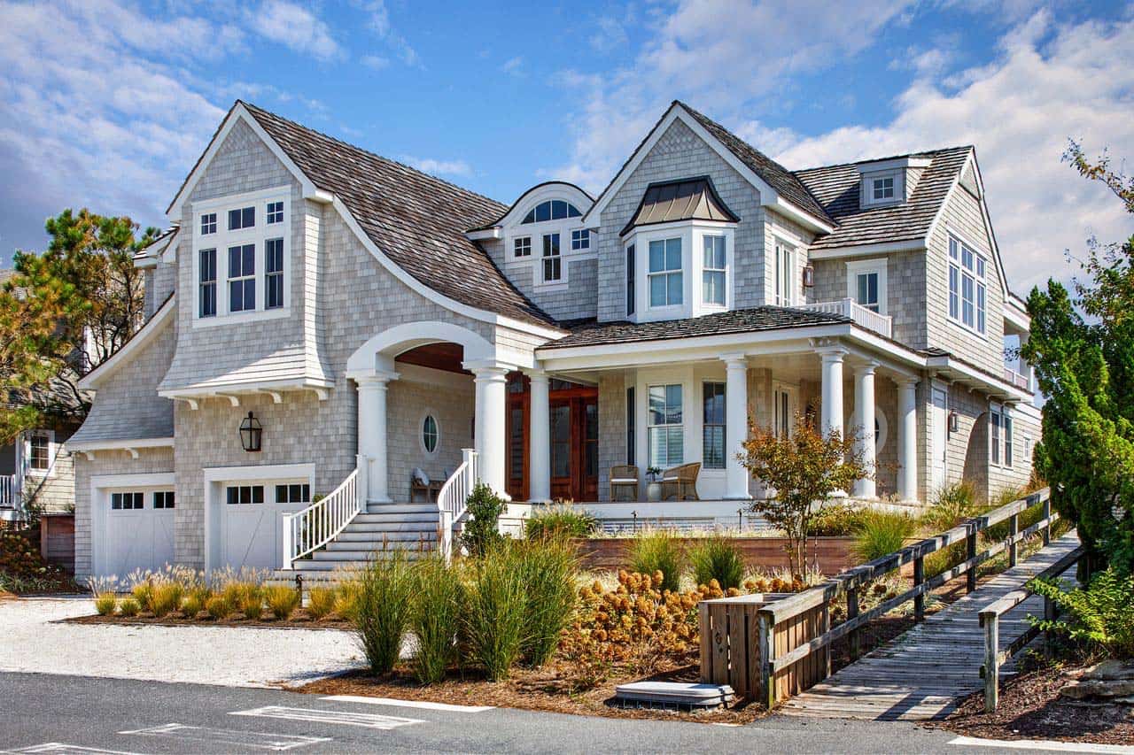 Full front facade with turret dormer and covered entry porch