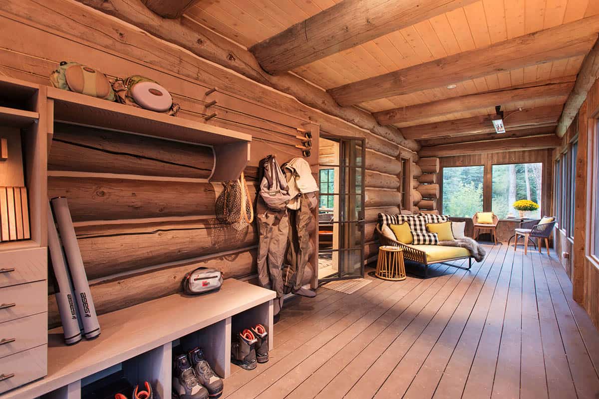 Mudroom with gear storage, boot cubbies, and log-wall bench seating
