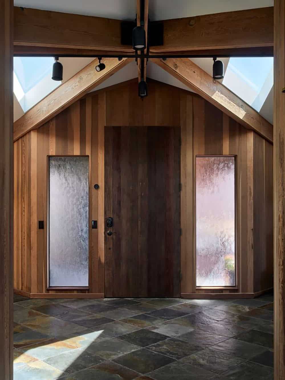 Front entry with vaulted cedar ceiling and triangular skylights