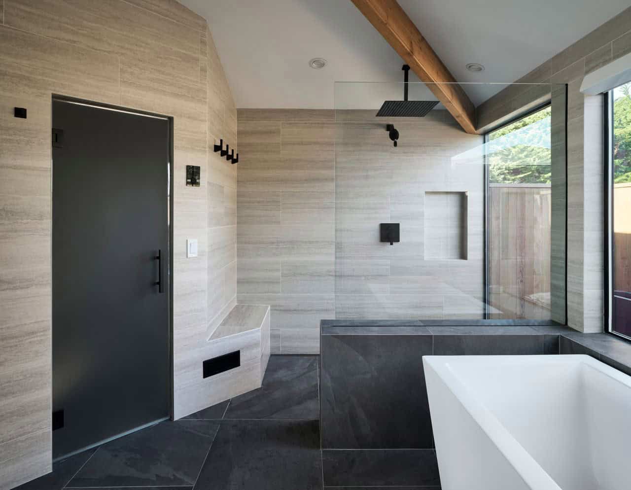 Spa-style bathroom with glass shower enclosure and freestanding tub
