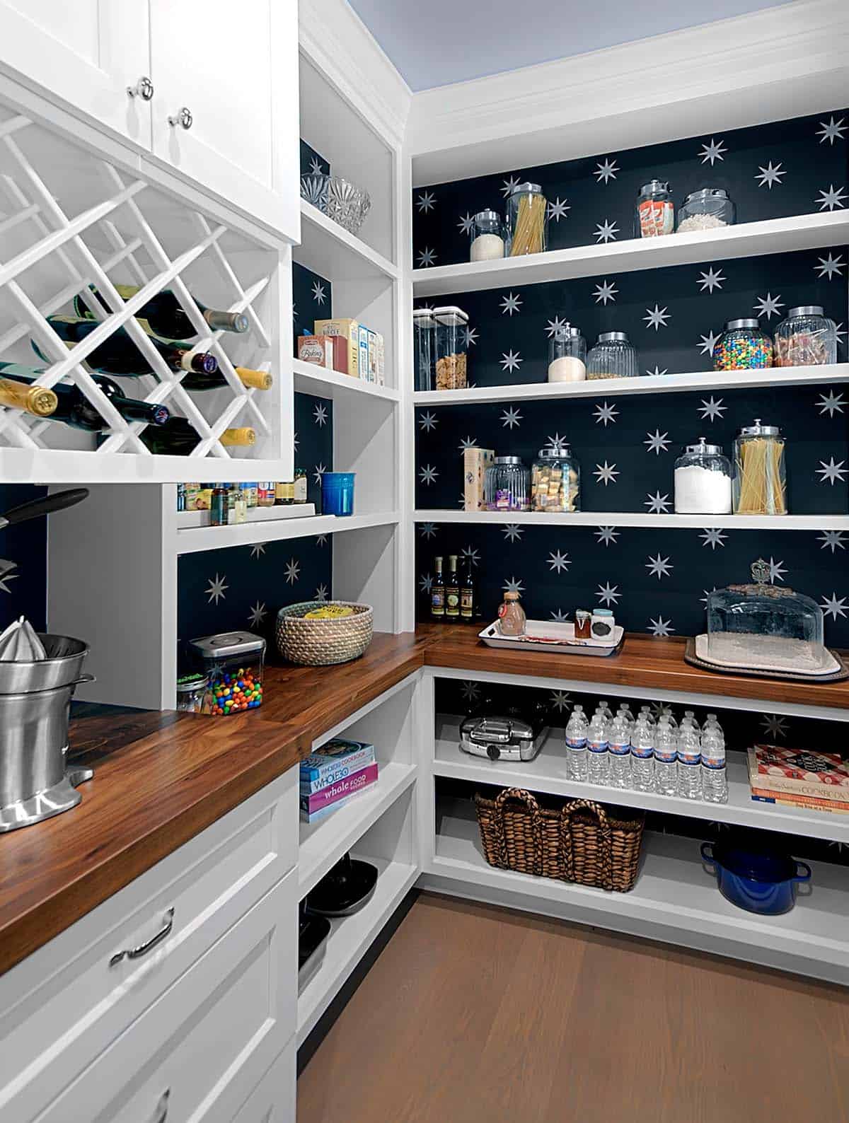 Pantry corner with wine rack, butcher-block counters, and star-print walls