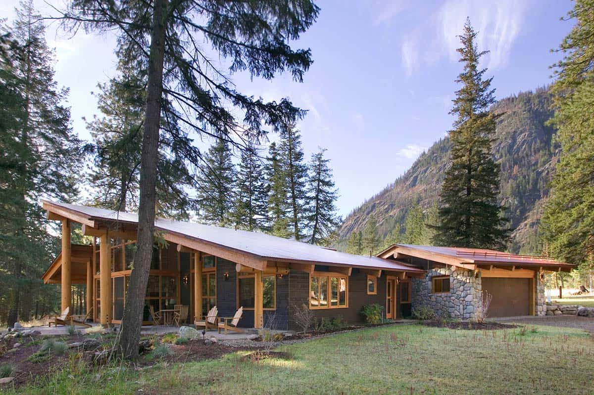 Side view of home showing shed roofline stretching toward garage