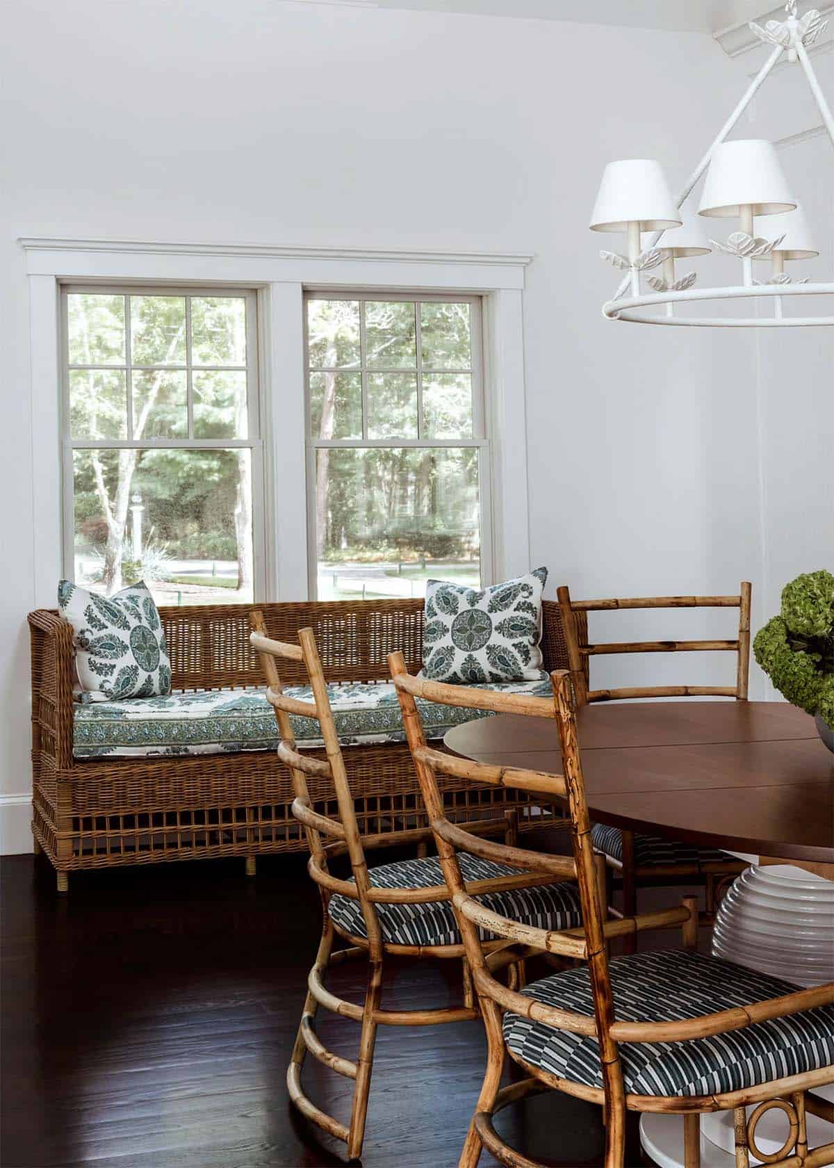Breakfast nook with wicker settee and bamboo dining chairs