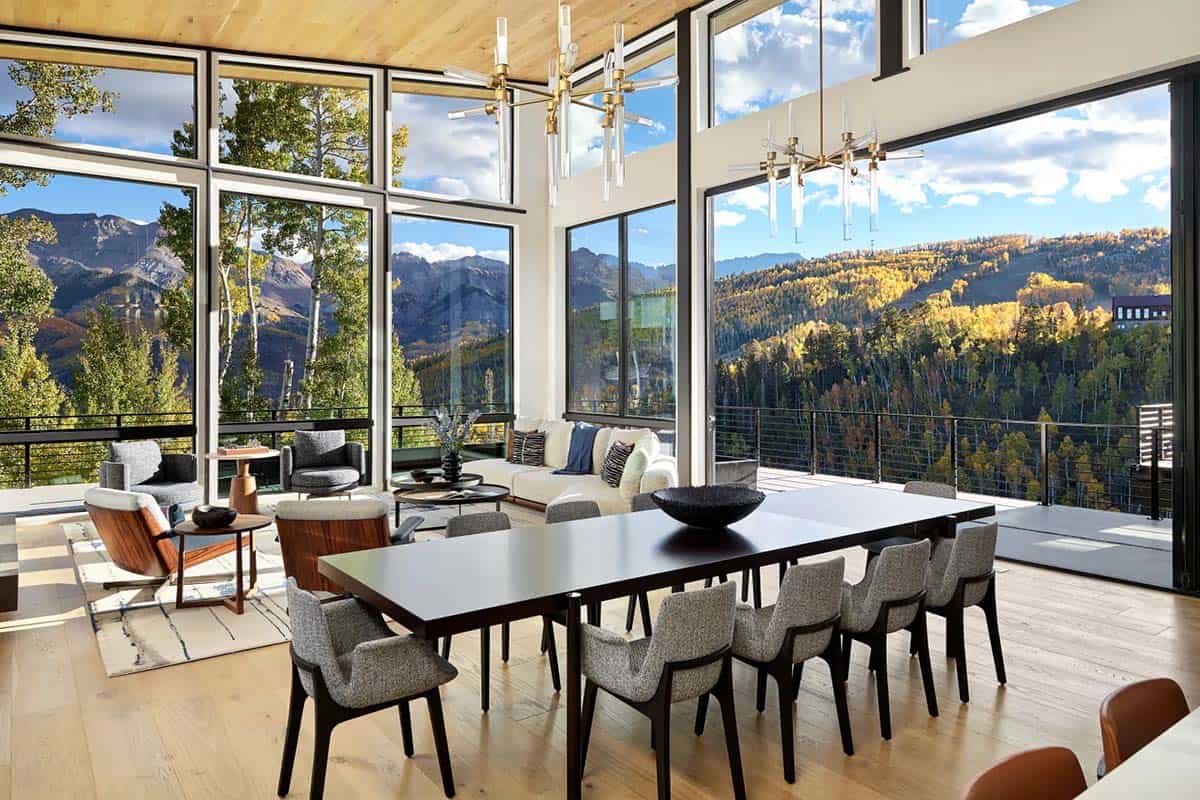 Open dining and living space with panoramic aspen valley views