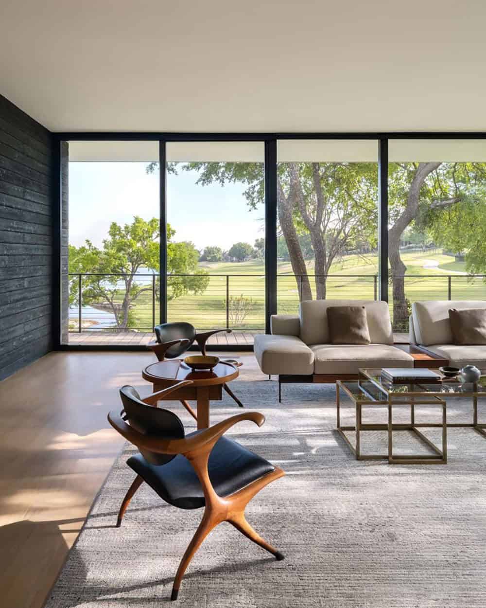 Living room seating area overlooking golf course and lake