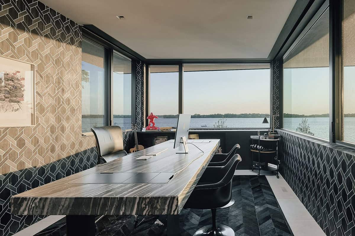Home office with herringbone tile and panoramic lake windows