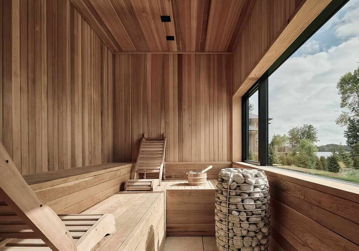 Cedar lined sauna with a view of the lake through the window