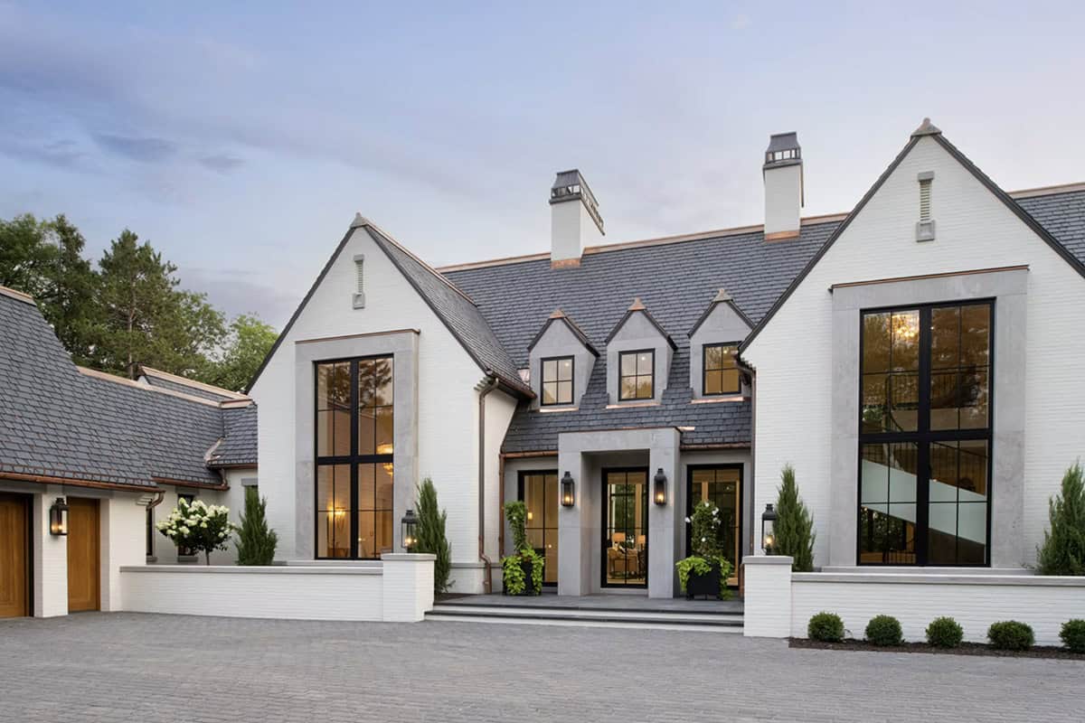 Angled exterior view showing layered gables and stone-trimmed windows