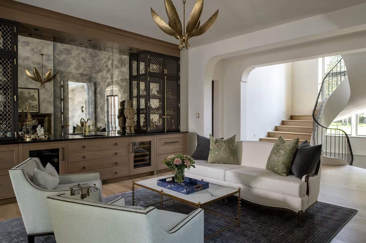 Bar area with antique mirror and woven metal cabinetry