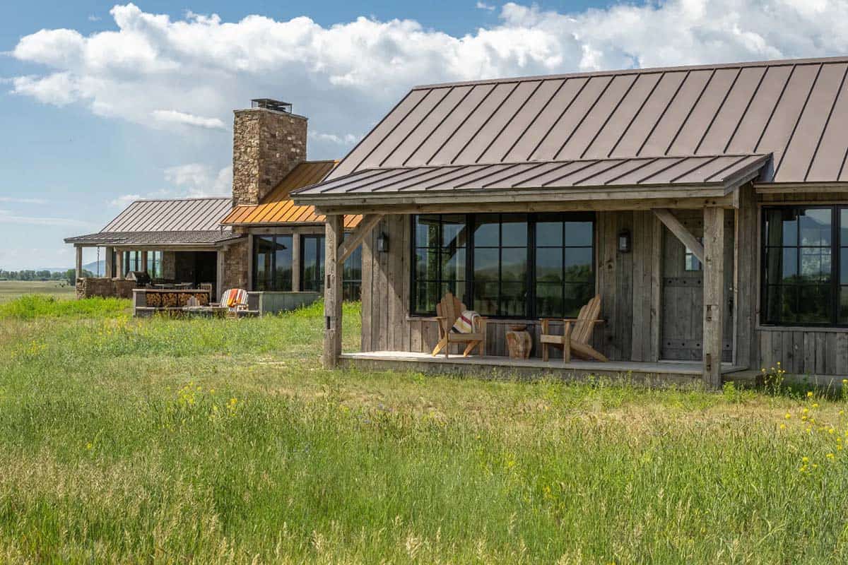 Fishing cabin porch with Adirondack chairs and metal roof