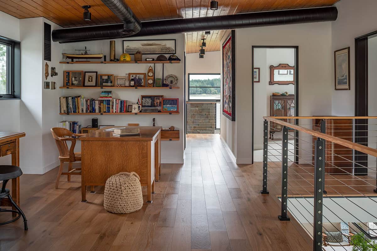 Home office nook with built in shelving and nautical memorabilia