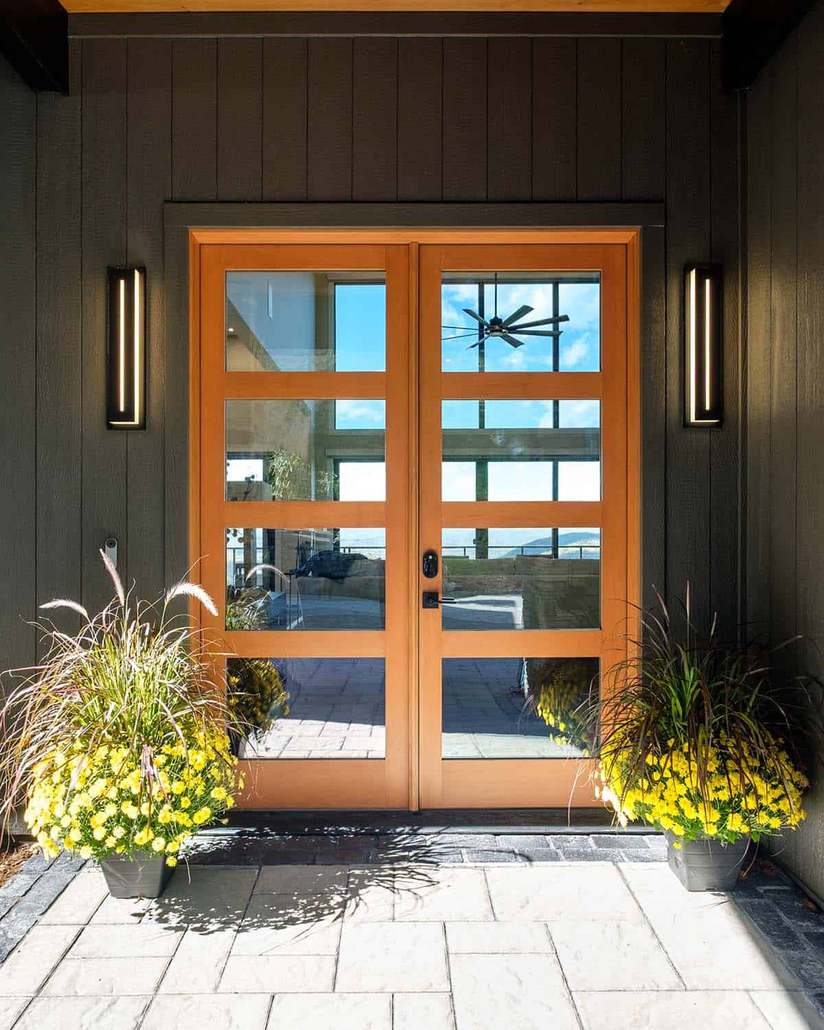 Front double doors with wood frame and glass panels