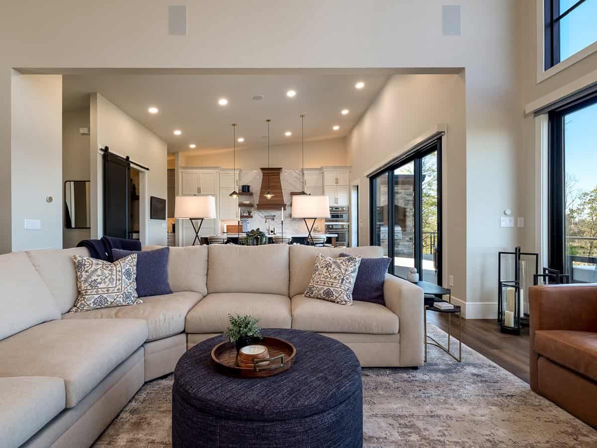 Living room sectional opening to kitchen and dining beyond