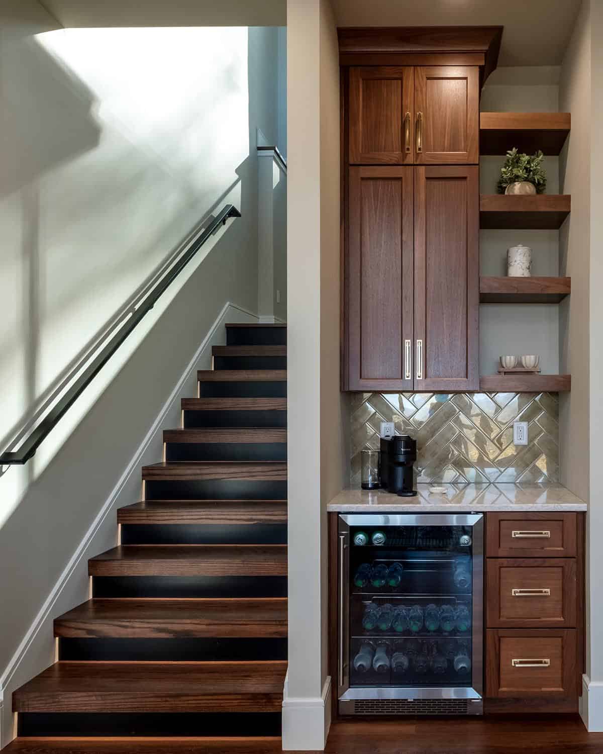 Under-stair wet bar with wine fridge and herringbone tile