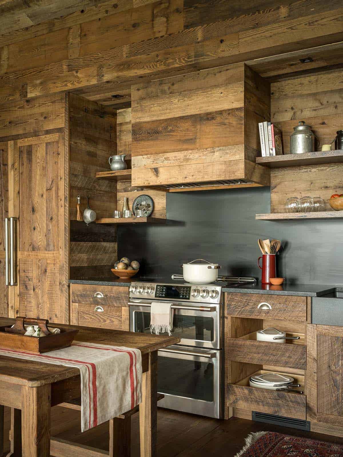 Close-up of kitchen range hood and open wood shelving