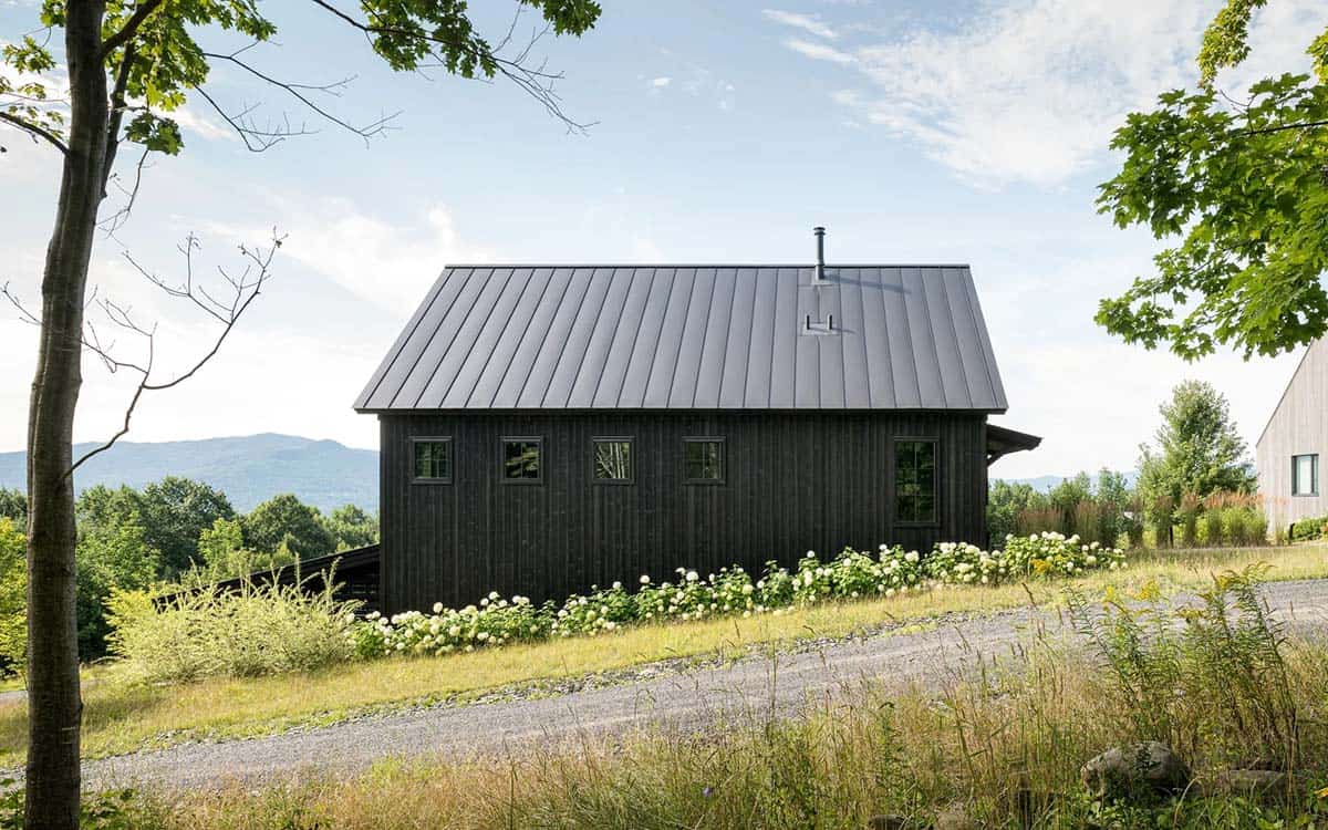 Black board and batten barn exterior with metal roof