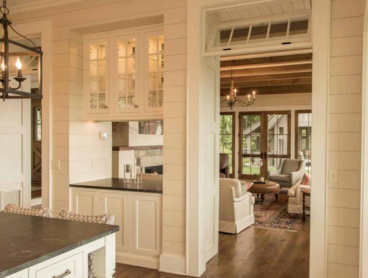 Shiplap butler's pantry opens to living room with French doors