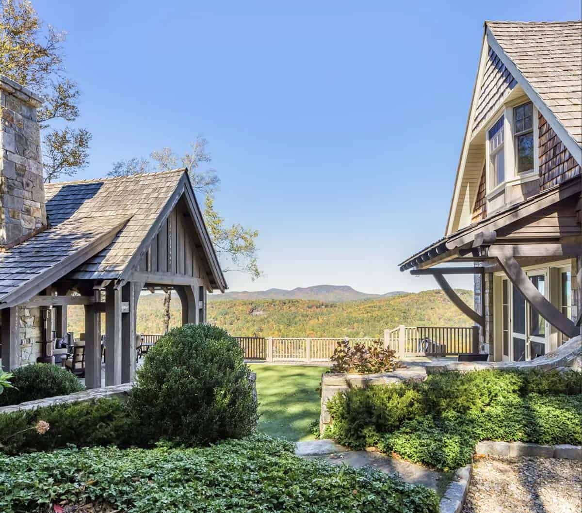View between guest cottage and main house toward distant mountains
