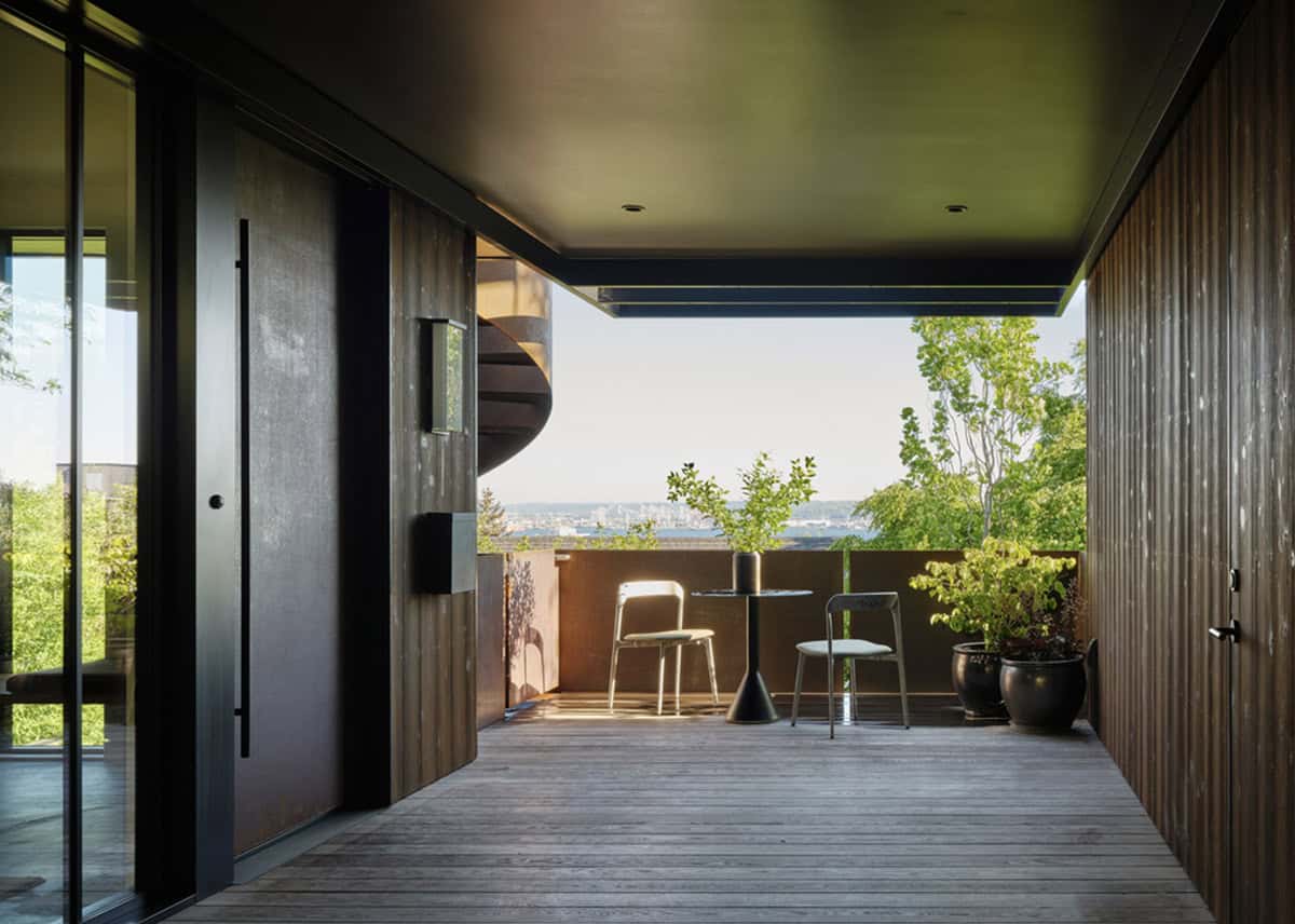 Rooftop deck with corten spiral stair and Elliott Bay views