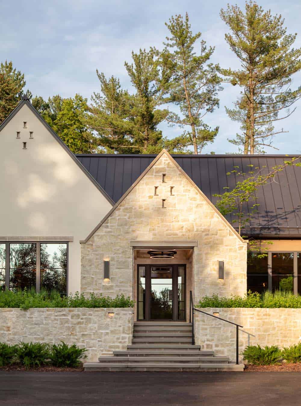 Afternoon exterior entryway with round black pendant light fixture
