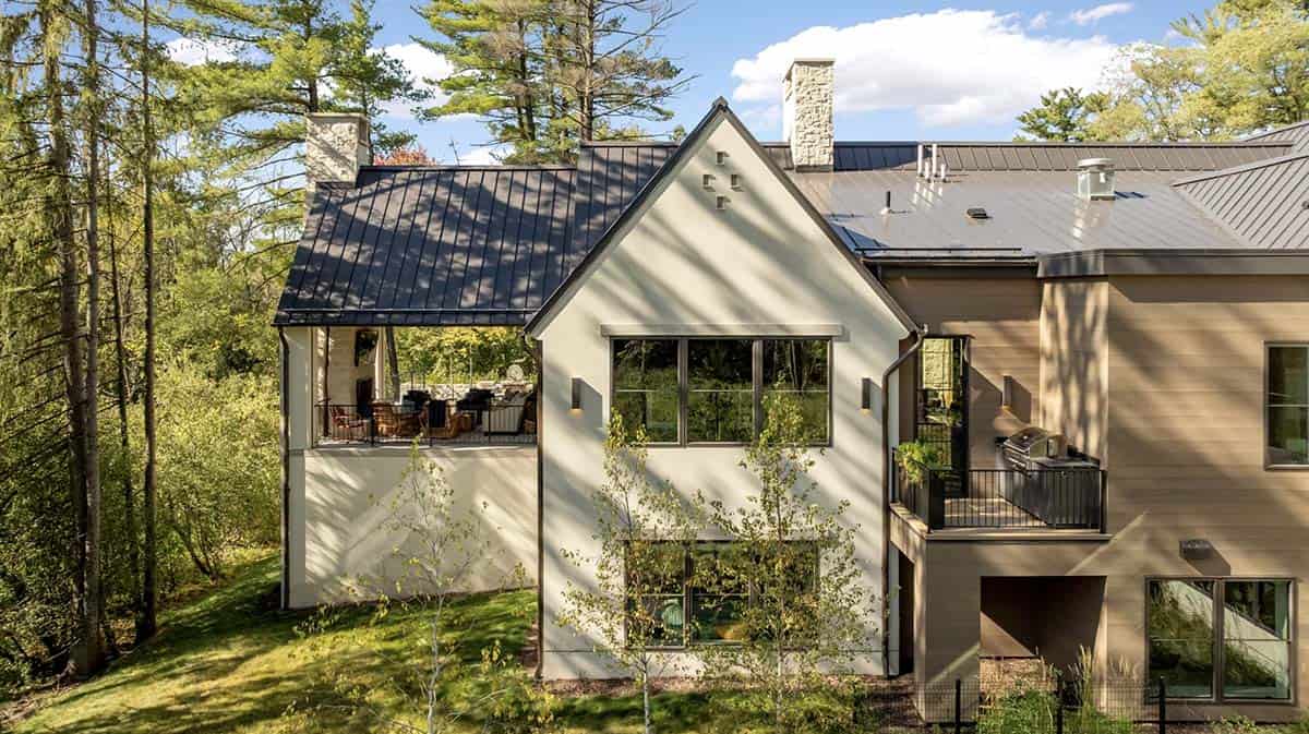 Elevated view of covered porch and second story balcony