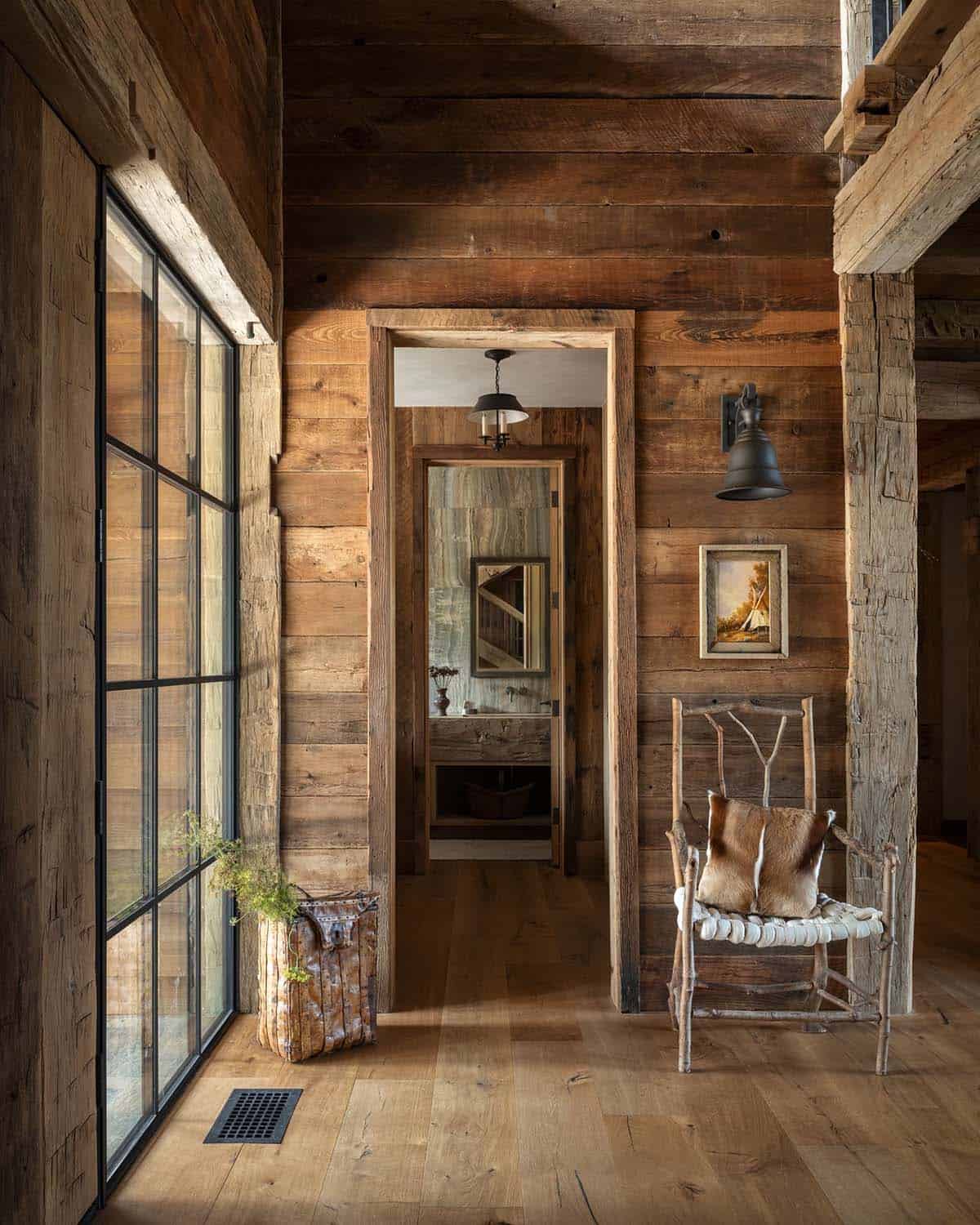 Hallway with a twig chair leading to a powder room
