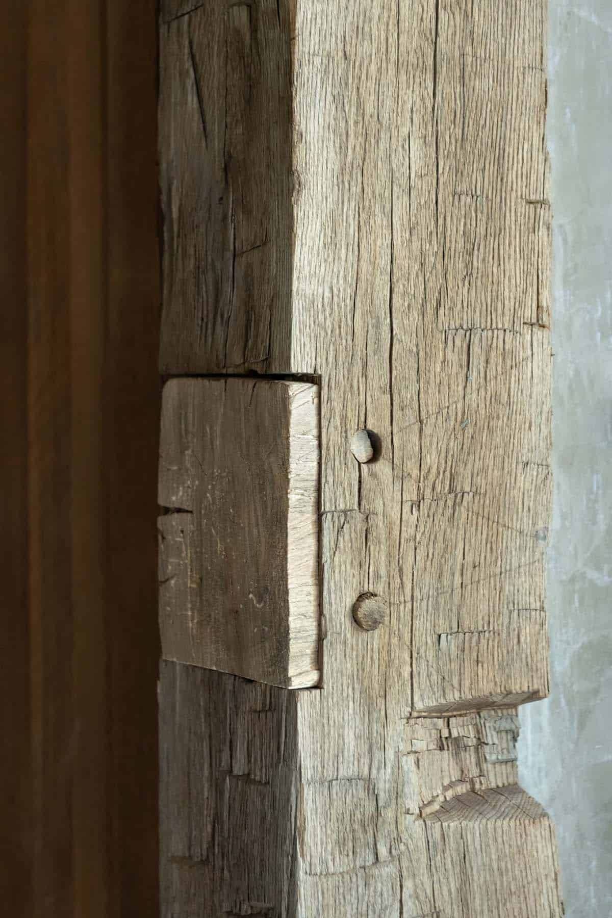 Close-up of a pegged timber joint