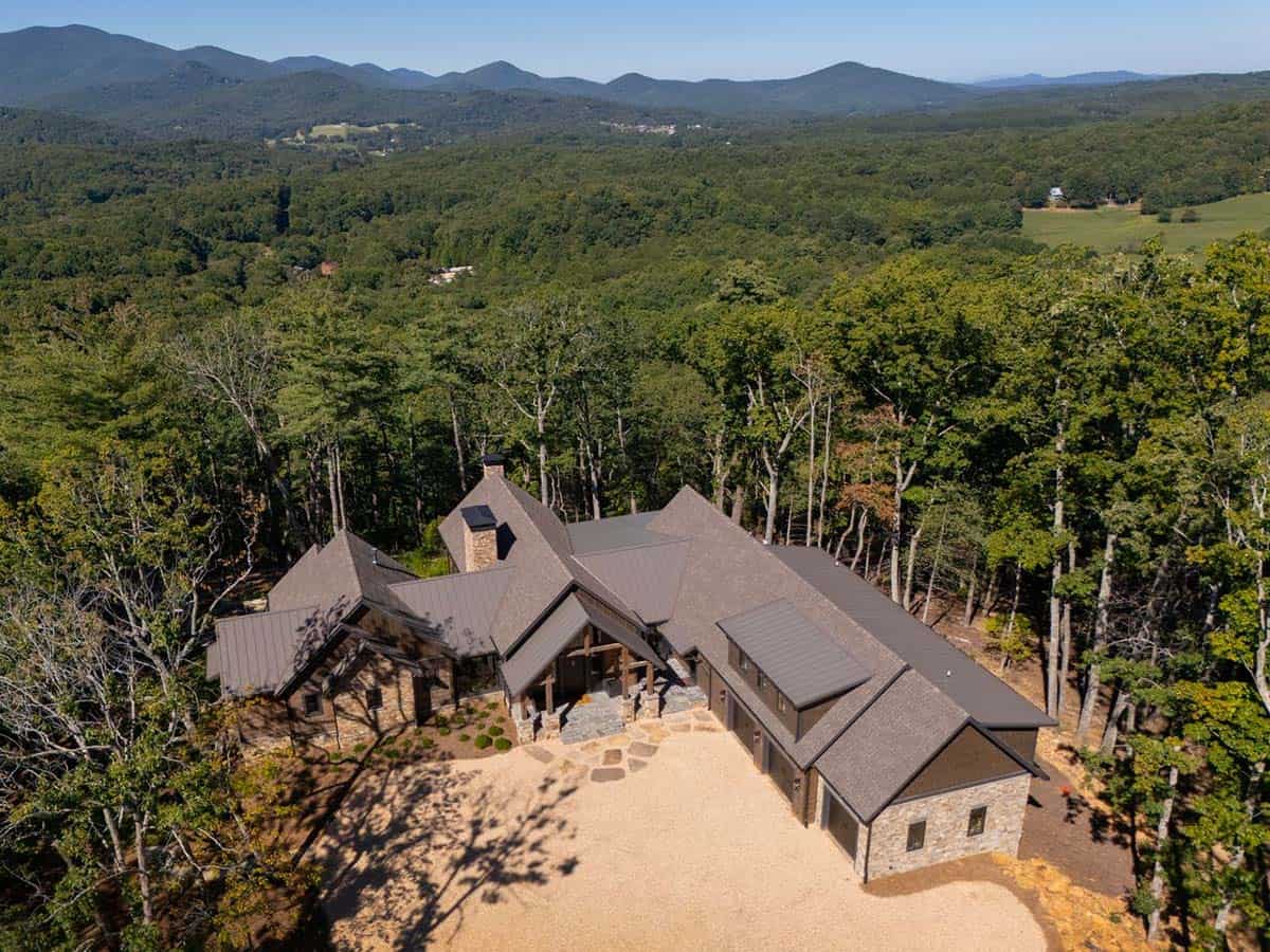 Aerial view of the lodge on a wooded mountaintop with Blue Ridge views