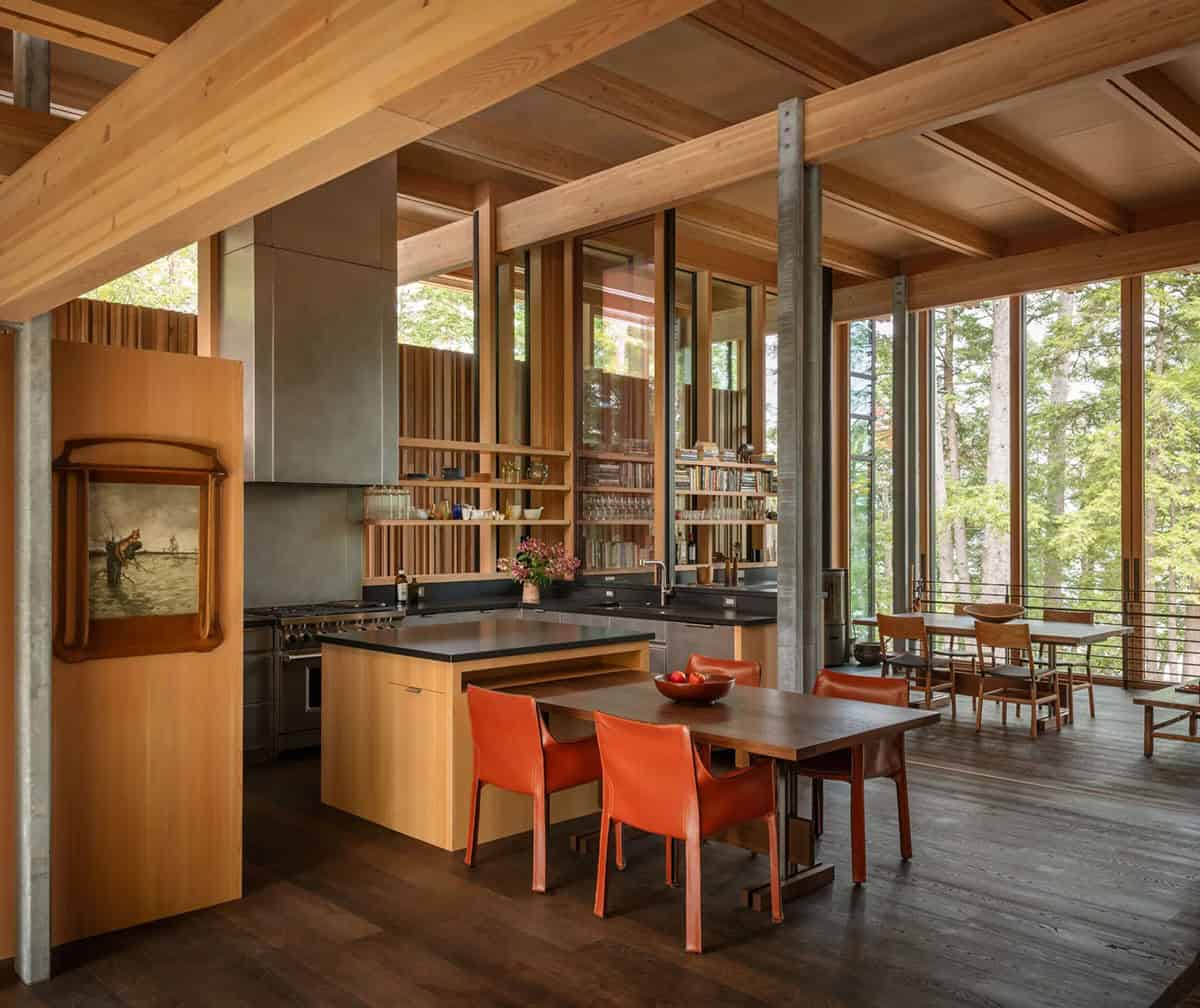 Kitchen and dining area open to the screened porch through glass sliders