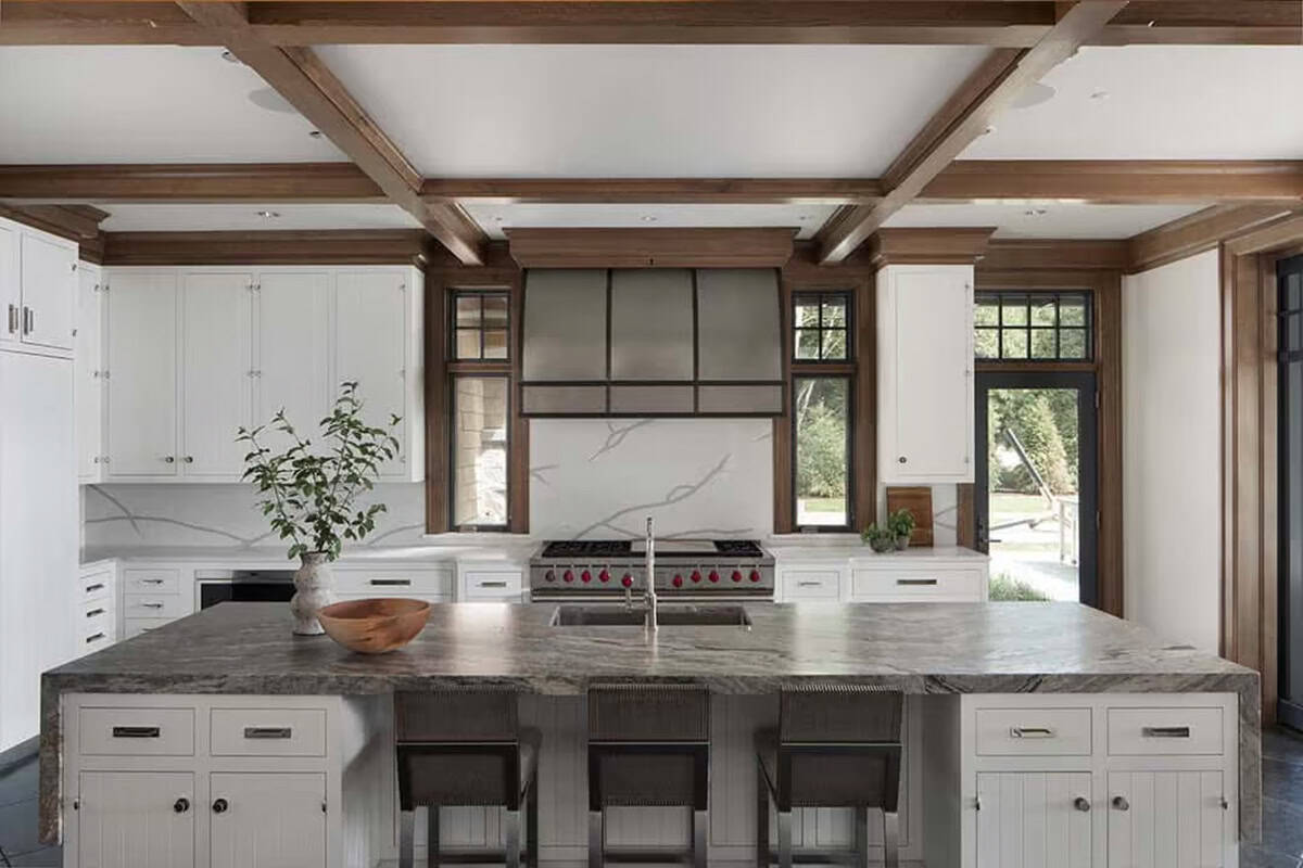 White cabinet kitchen with innovative dripping countertop