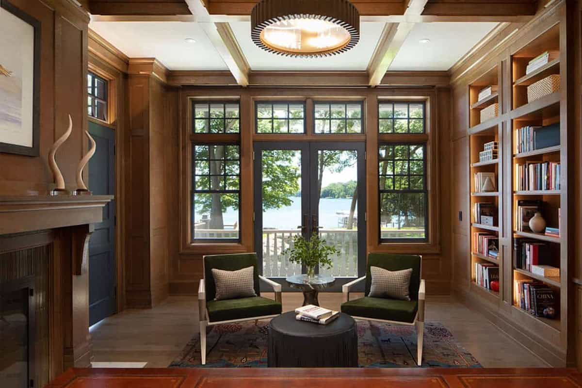 Library sitting area with French doors overlooking the lake