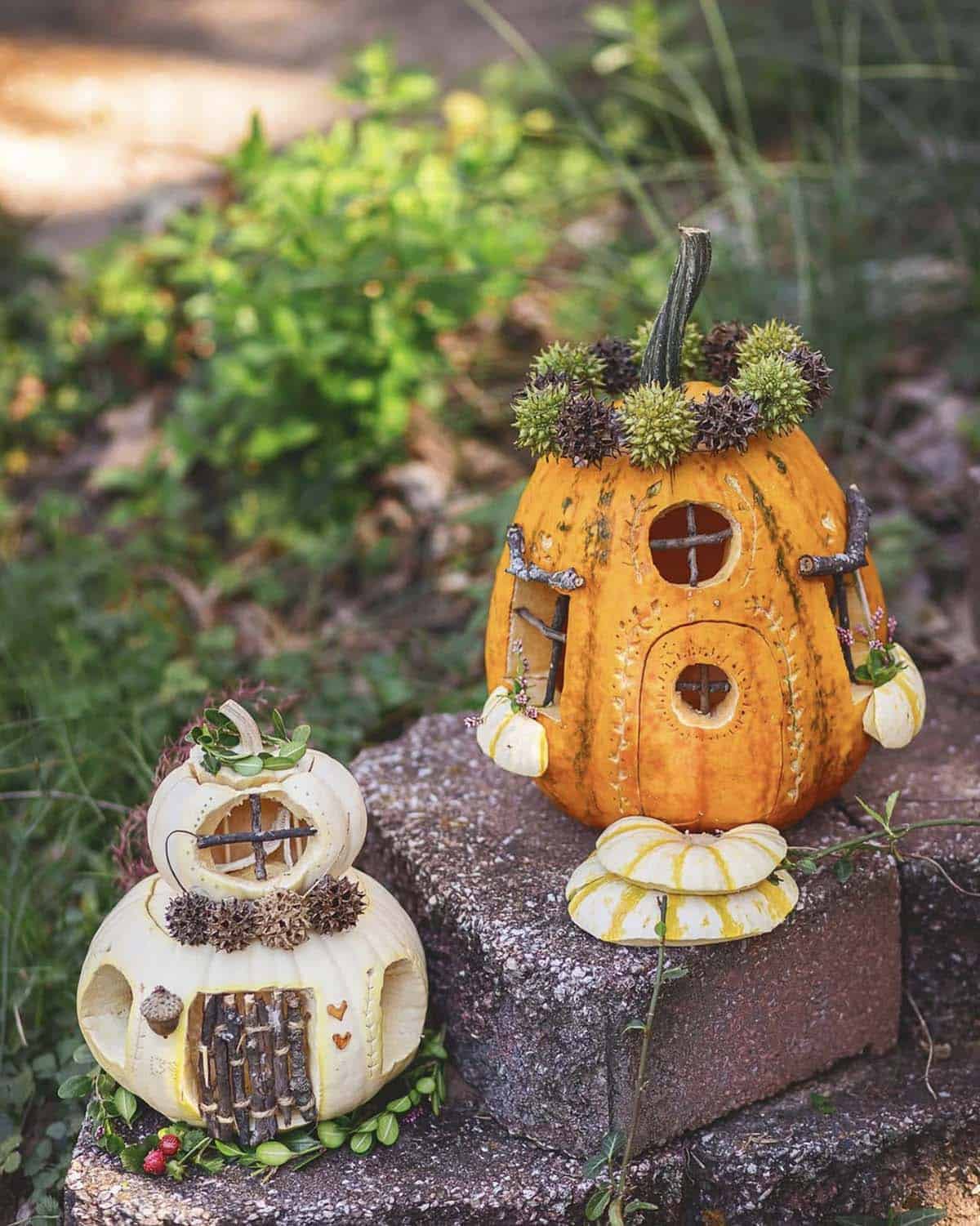 orange and white fairy house pumpkins with sweetgum pod roofs, twig windows, etched vines, and gourd window boxes