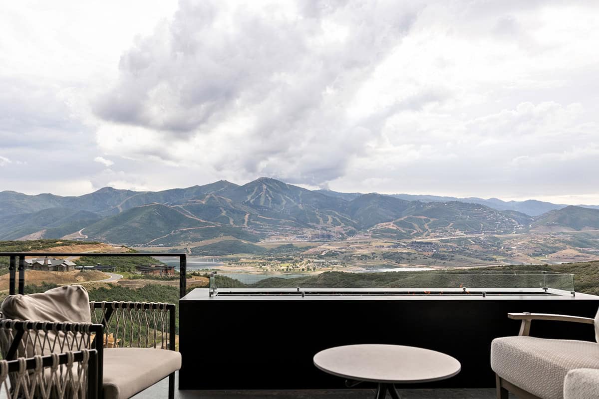 Terrace fire table overlooking ski mountain and reservoir