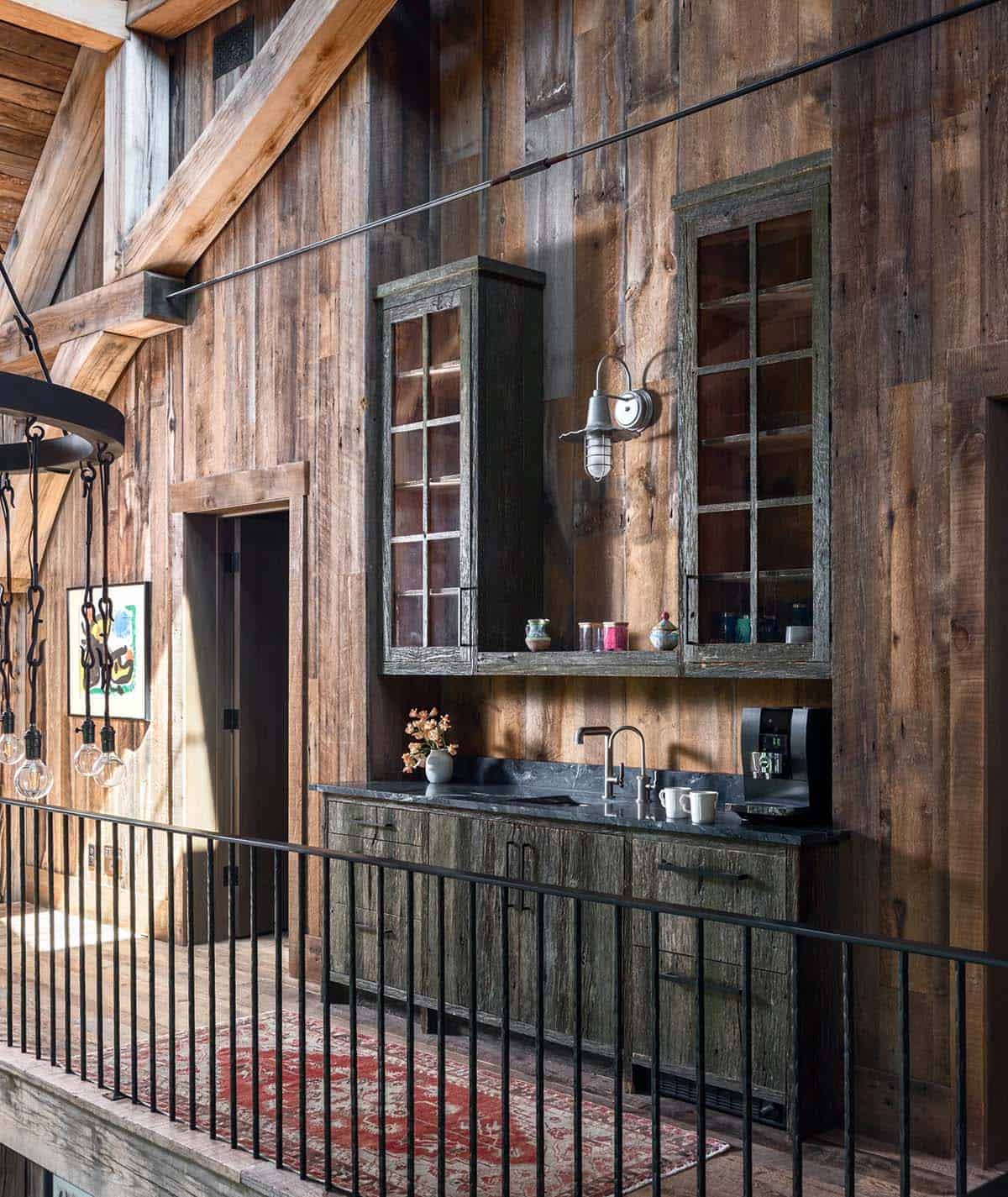 Loft coffee bar with glass-front cabinets and soapstone counter