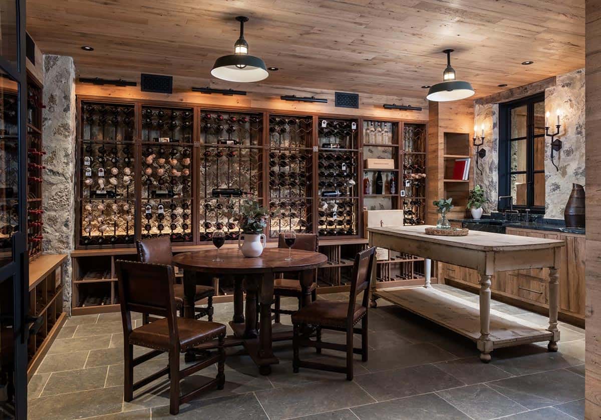 Wine cellar with leather chairs and vintage work table