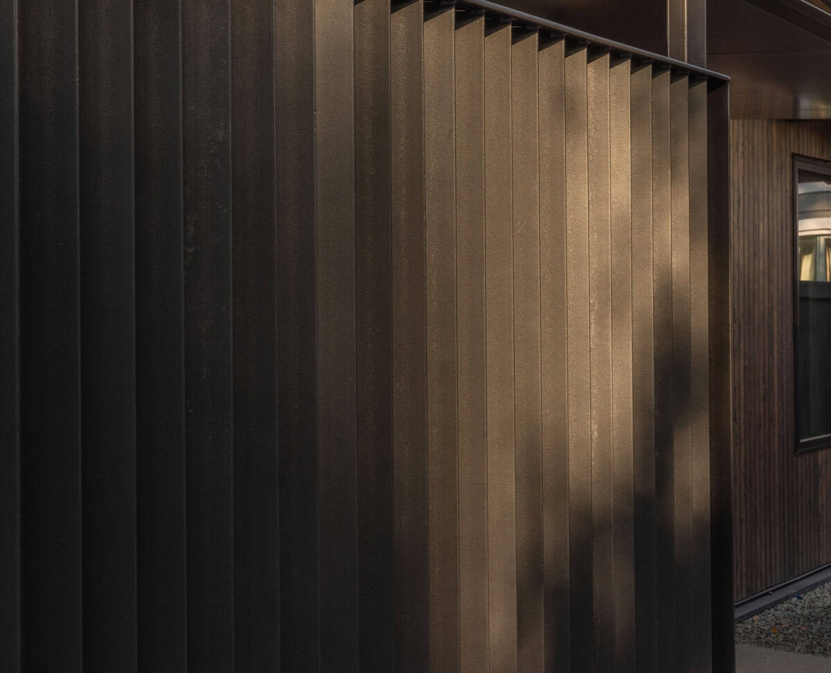 Close-up of textured black steel slats