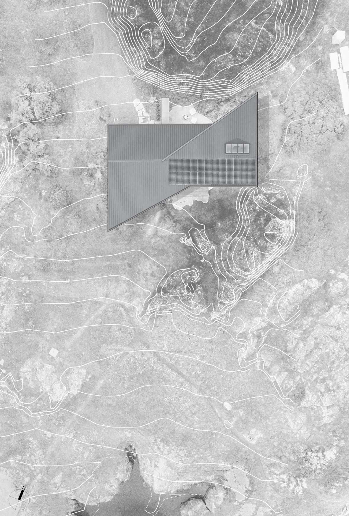 San Juan Island home site plan of the angular metal roof, with solar panels, set among rocky terrain and contour lines