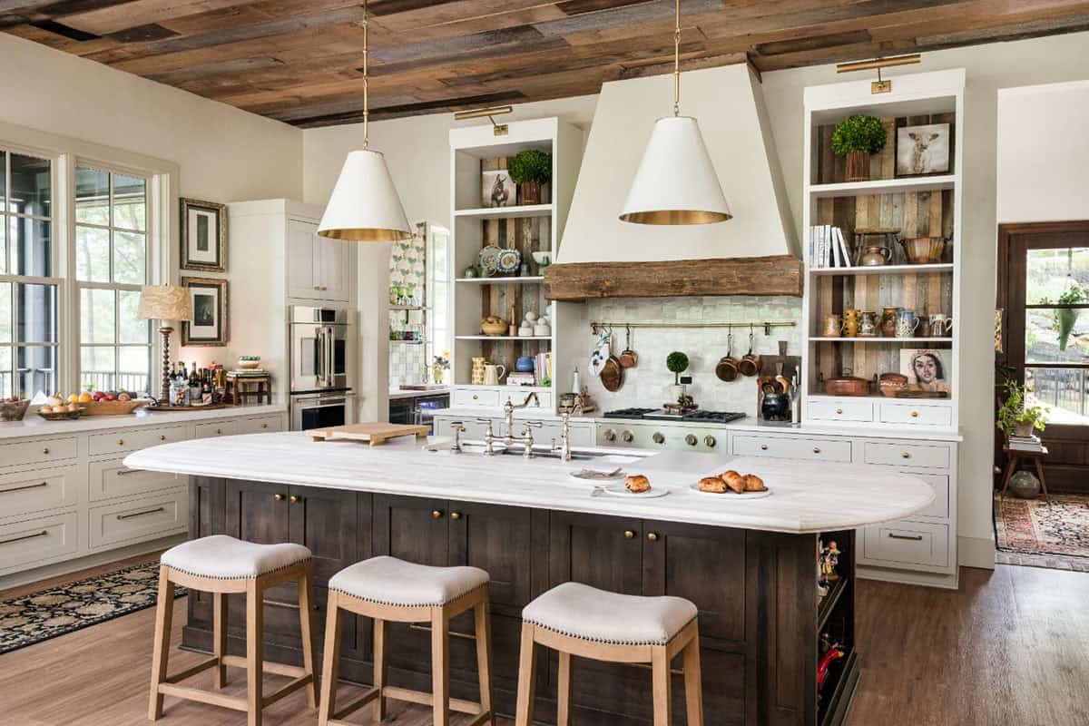 Kitchen with reclaimed wood ceiling, white plaster hood and dark wood island