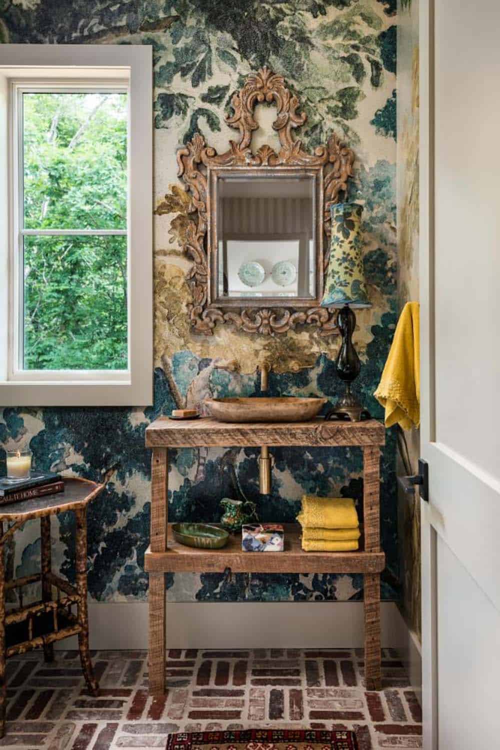 Powder room with scenic mural wallpaper, carved mirror and wood bowl sink